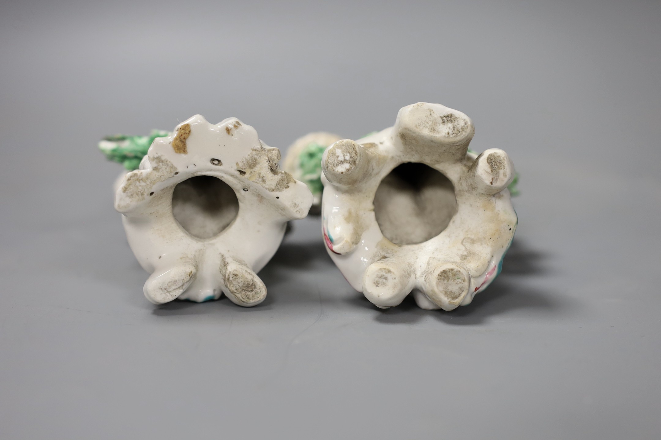 A pair of late 18th century Derby putti, 13 cms high